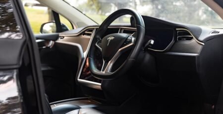 High-quality reflective EV roof sunshade installed in a panoramic glass roof to block UV rays