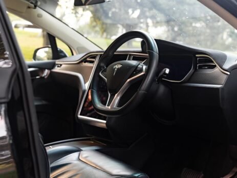 High-quality reflective EV roof sunshade installed in a panoramic glass roof to block UV rays
